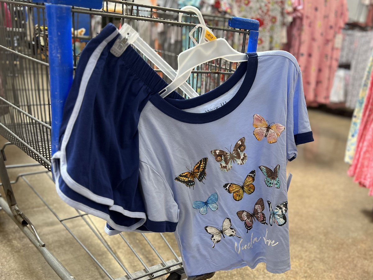 blue butterfly pajama set hanging on walmart cart