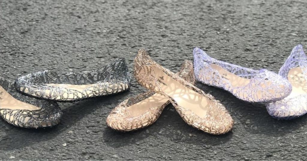 Jelly Glitter Shoes shown on asphalt