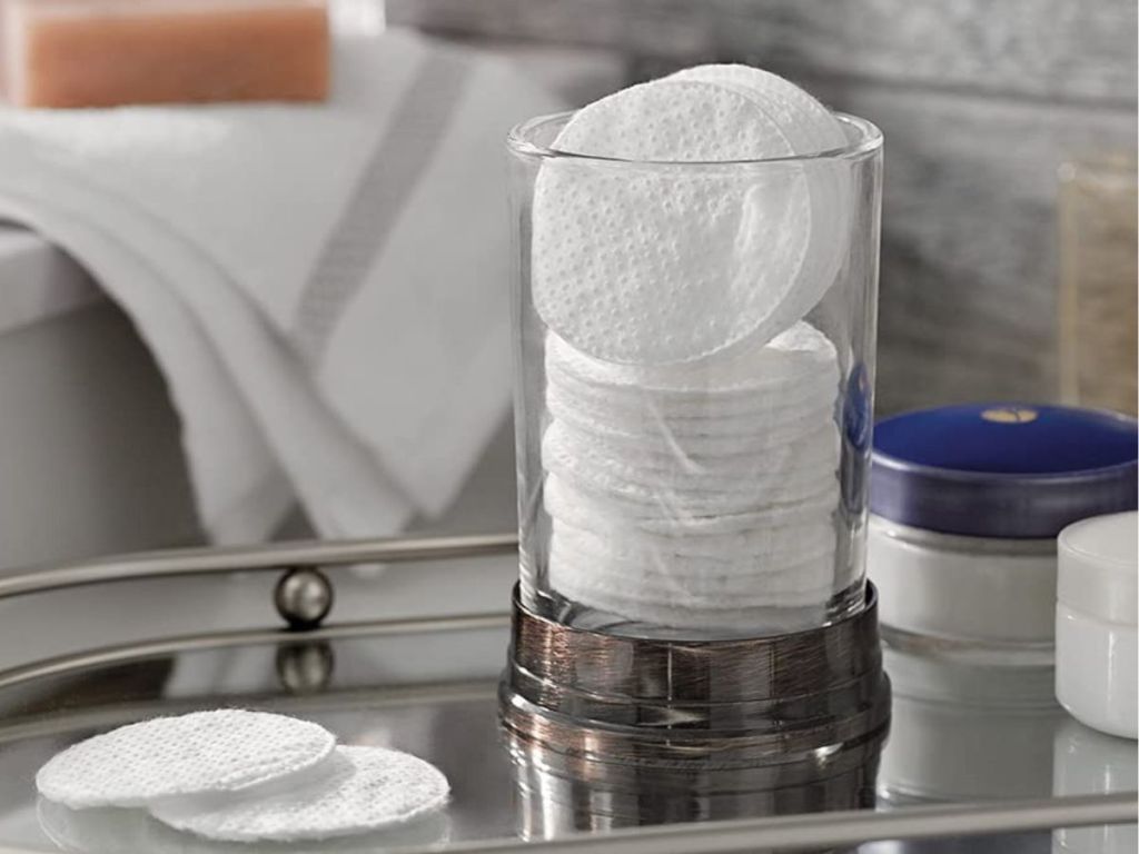 Cotton rounds in a glass container