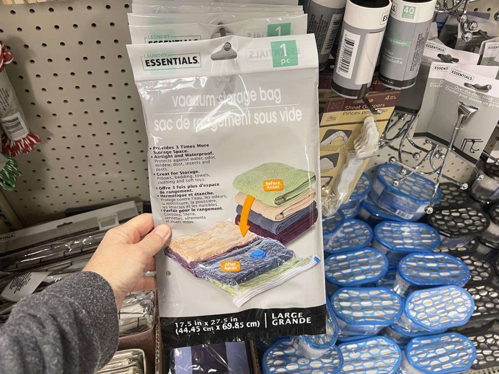 hand holding pack of vacuum storage bags