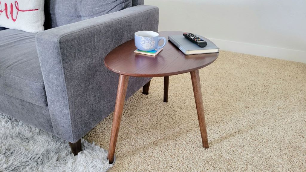 Wooden table next to a couch