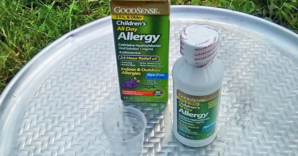 box, cup, and bottle of GoodSense Children&rsquo;s All-Day Allergy Liquid