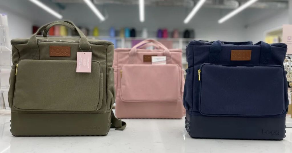 New Bogg Canvas Backpack bags shown in olive green, pink and navy