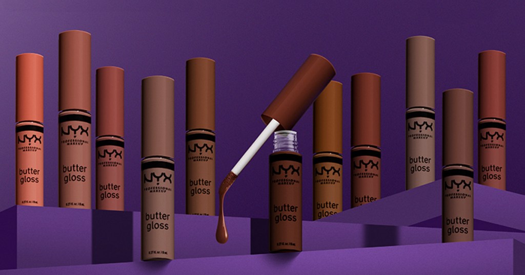 multiple tubes of NYX Butter Lip Gloss on purple blocks