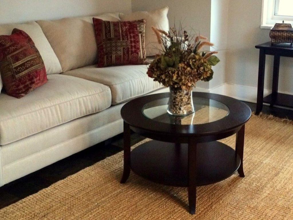 Winsome Glass Coffee Table in living room with vase set on it