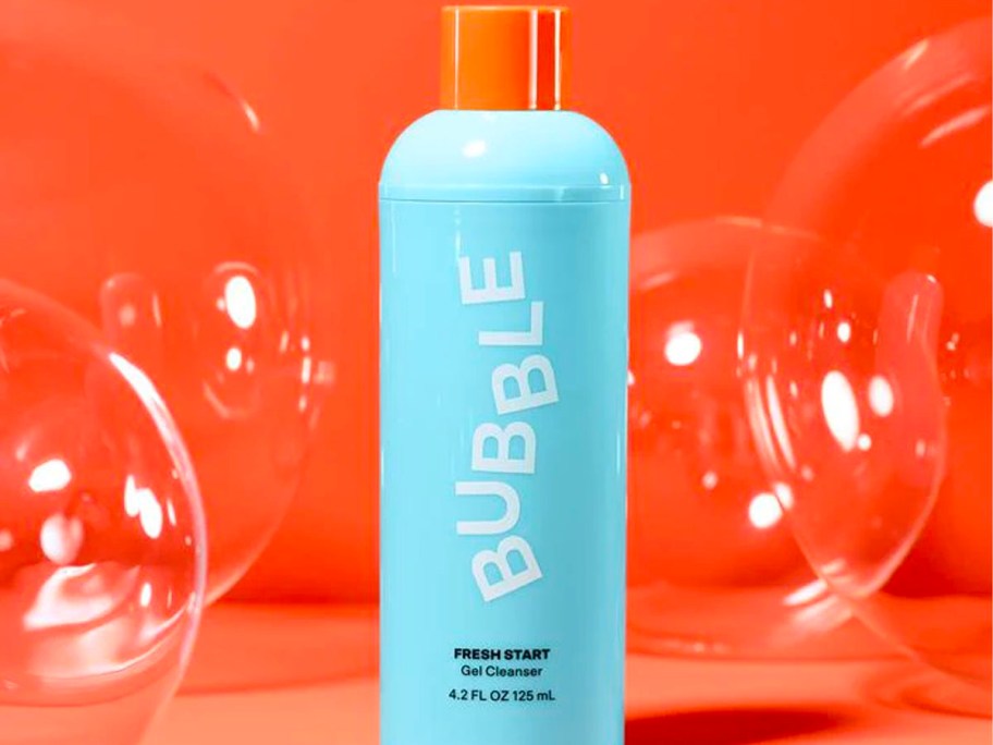 bubble gel cleanser next to bubbles