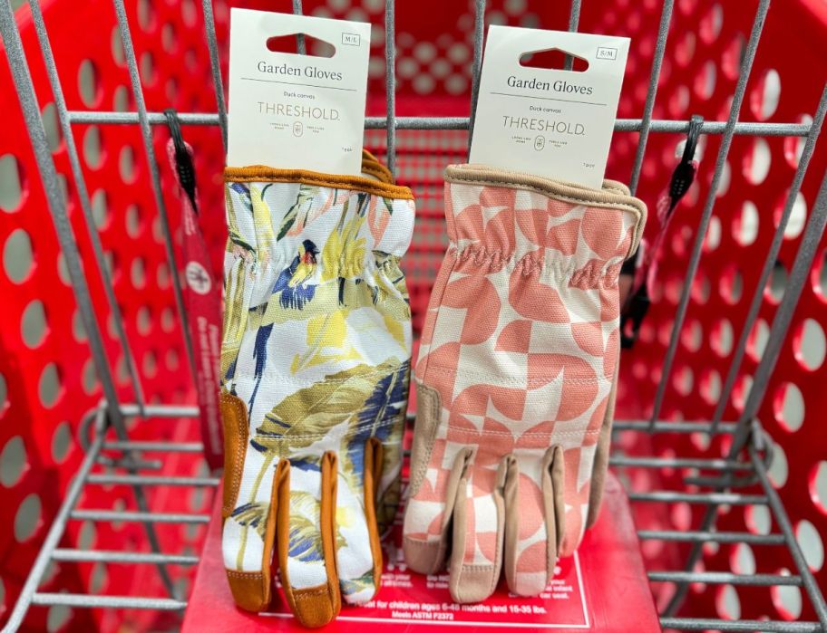 two pair of garden gloves in a shopping cart