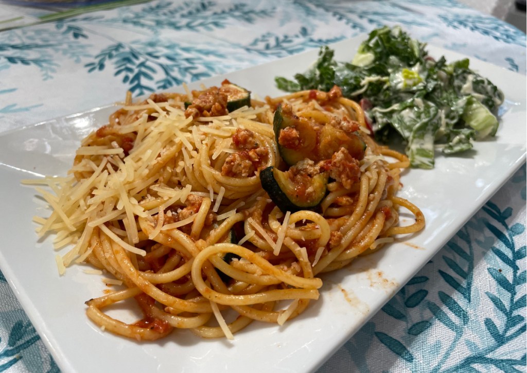 plate of pasta and salad