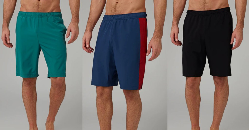 three men wearing different colored shorts