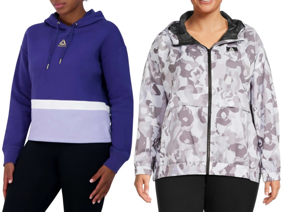 woman wearing a purple colorblock Reebok hoodie next to a woman wearing a grey animal print Reebok zip up jacket