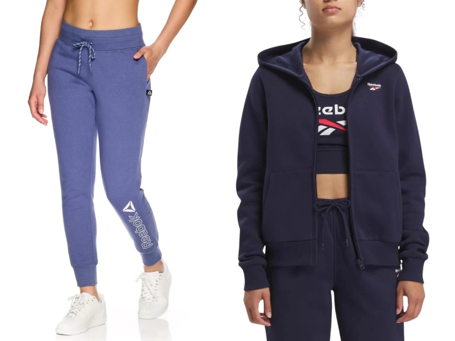 woman wearing bluish purple Reebok logo joggers next to a woman wearing an open zip up Reebok hoodie