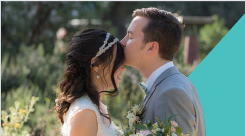 married couple man kissing woman on head