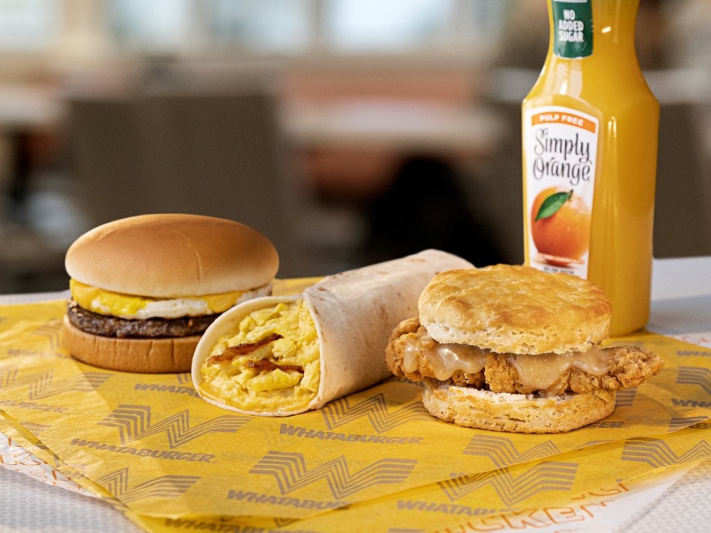 3 Whataburger breakfast entrees with orange juice