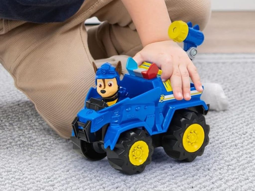 Paw Patrol, Dino Rescue Chase&rsquo;s Deluxe Rev Up Vehicle with Mystery Dinosaur Figure 