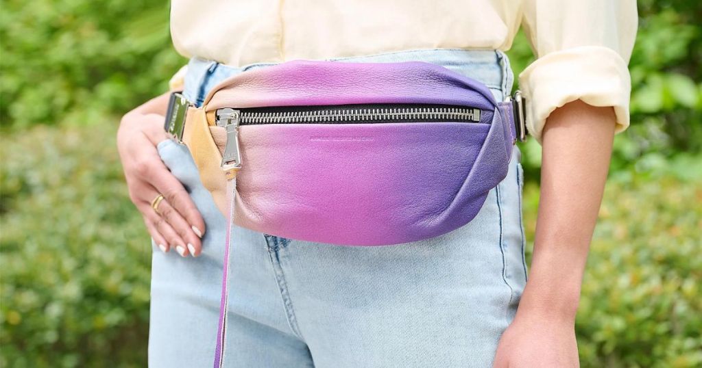 person wearing ombre leather belt bag
