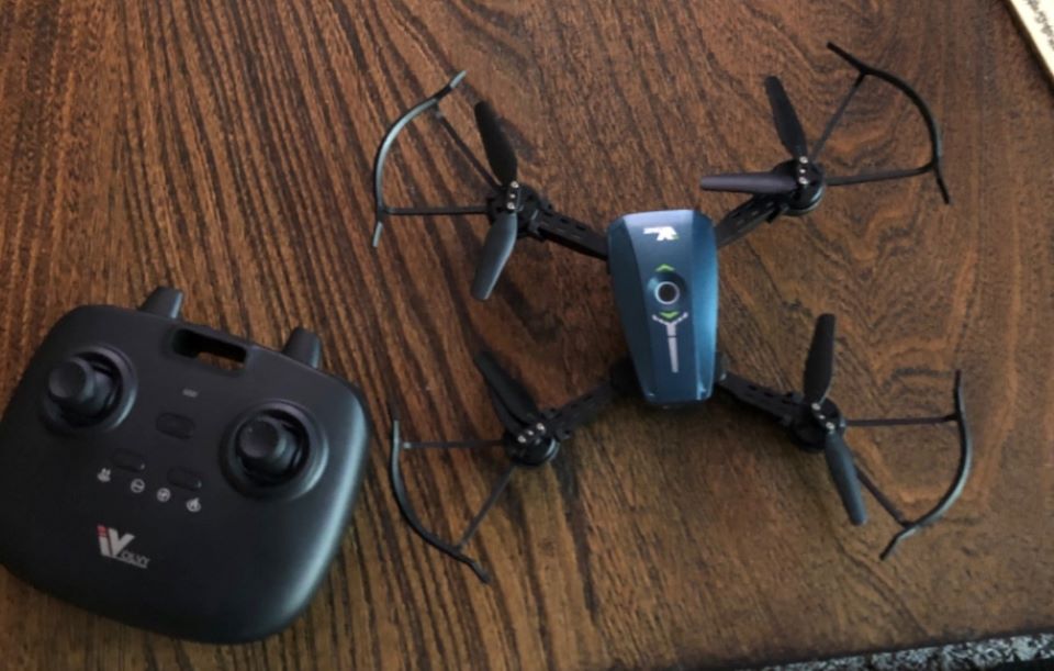 Drone next to the remote on a table