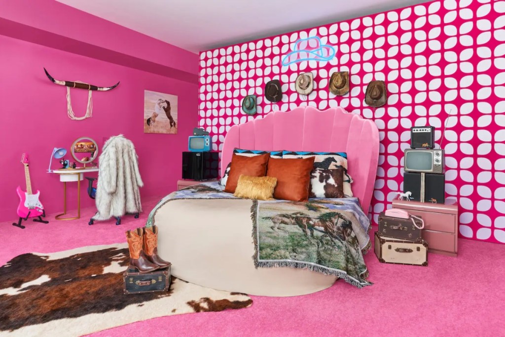 pink bedroom with cowboy decor