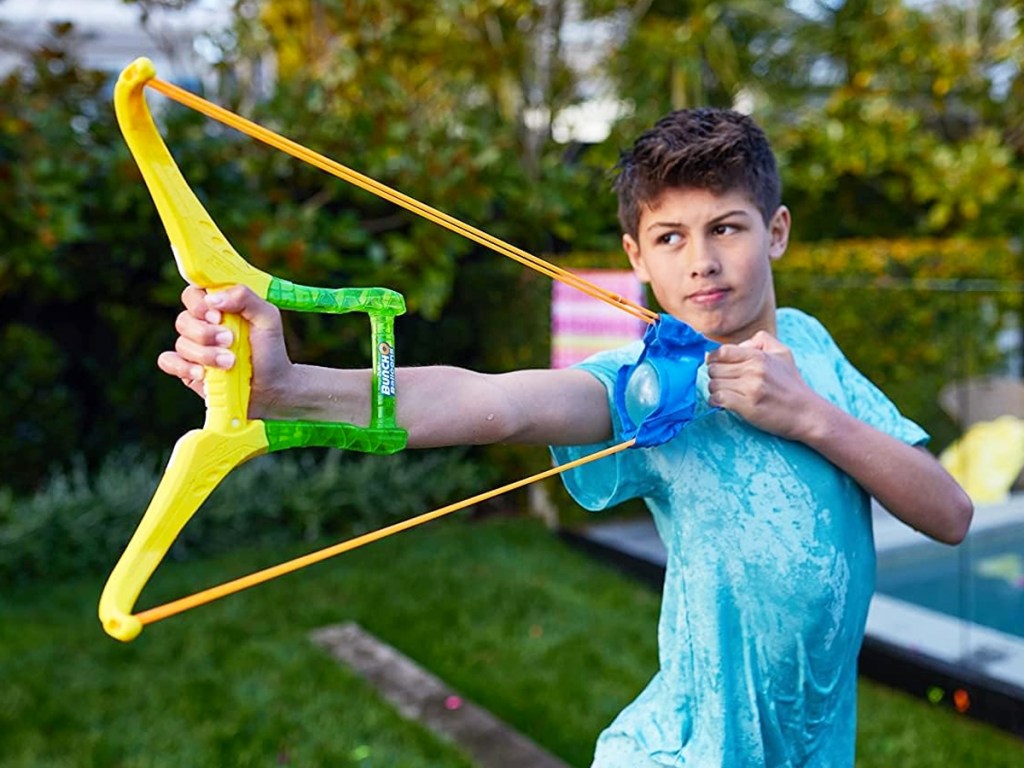 boy playing with Bunch O Balloons Slingshot