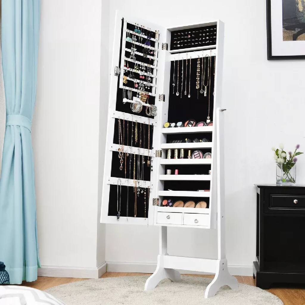 A white full length mirror that doubles as a jewelry organizer and holder