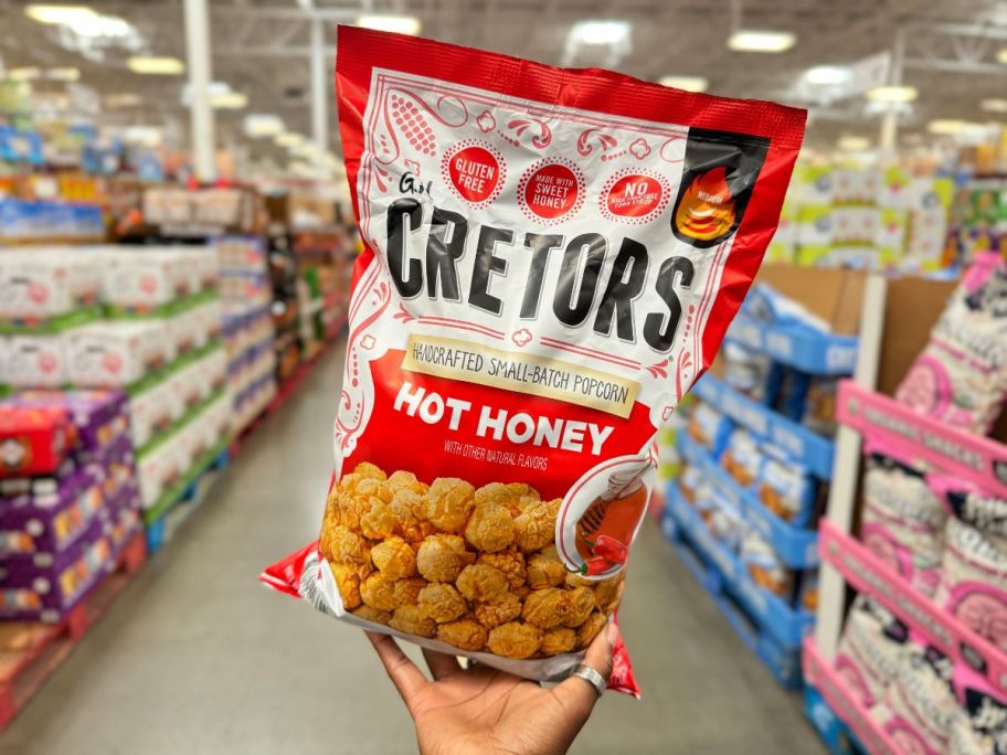 Cretors Hot Honey Kettle Popcorn 14oz in hand in store