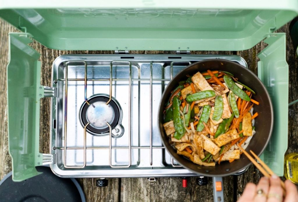 Pan with food in it on a camp stove