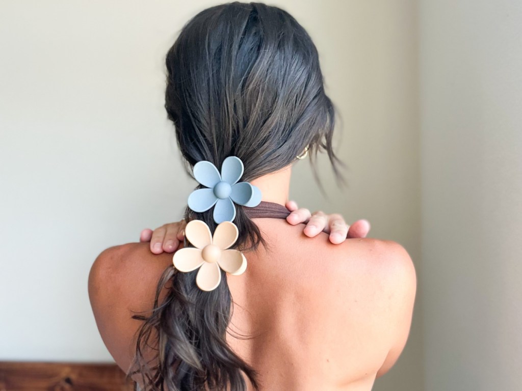 blue & cream colored flower hair clips in ponytail