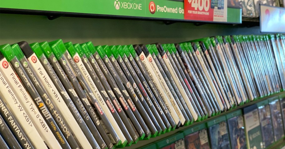 shelf of pre-owned xbox games