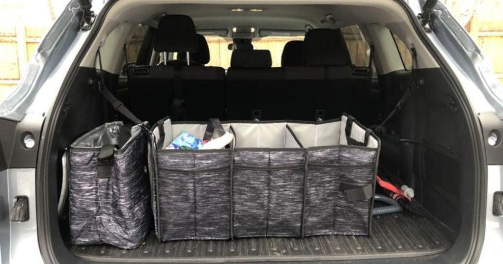 Member's Mark Insulated Trunk Organizer and 30-Can Cooler shown in back of an SUV 
