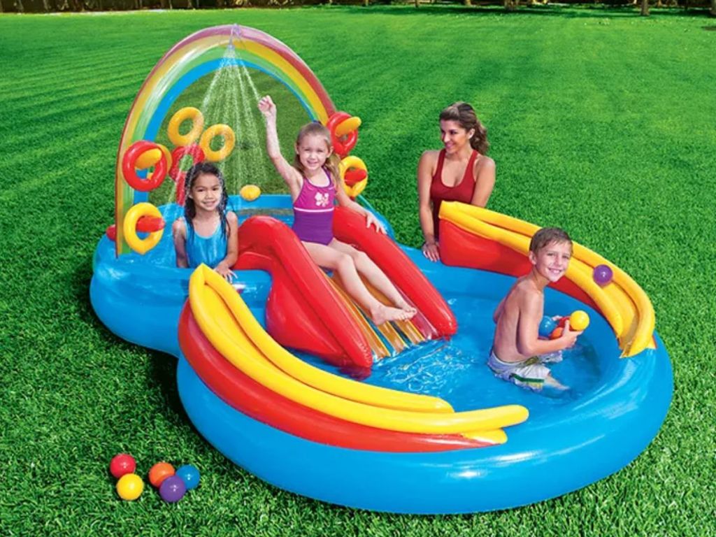 Intex Rainbow Ring Inflatable Kids Playcenter shown with kids playing in it 