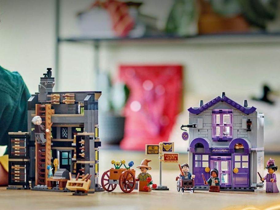 A fully constructed LEGO Harry Potter Ollivanders & Madam Malkin's Robes Set on a table