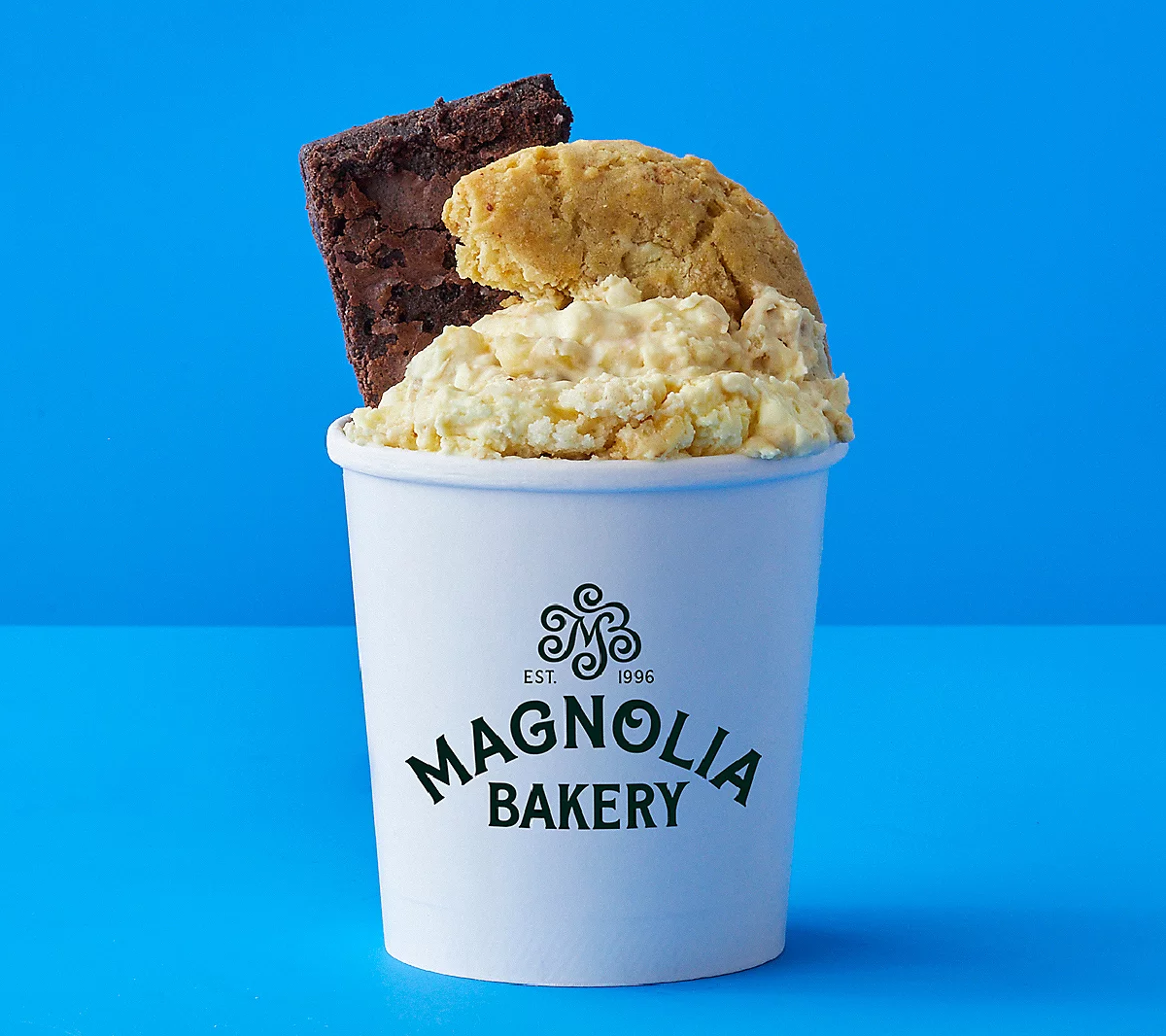 Magnolia bakery banana pudding topped with a double-fudge brownie and a soft-baked banana pudding cookie
