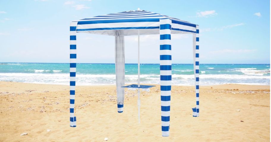 Mainstays 6' Blue & White Stripe Beach Umbrella Canopy on beach