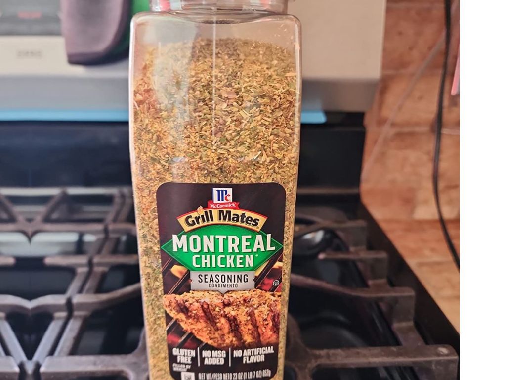 McCormick Grill Mates Montreal Chicken Seasoning bottle on a gas stove