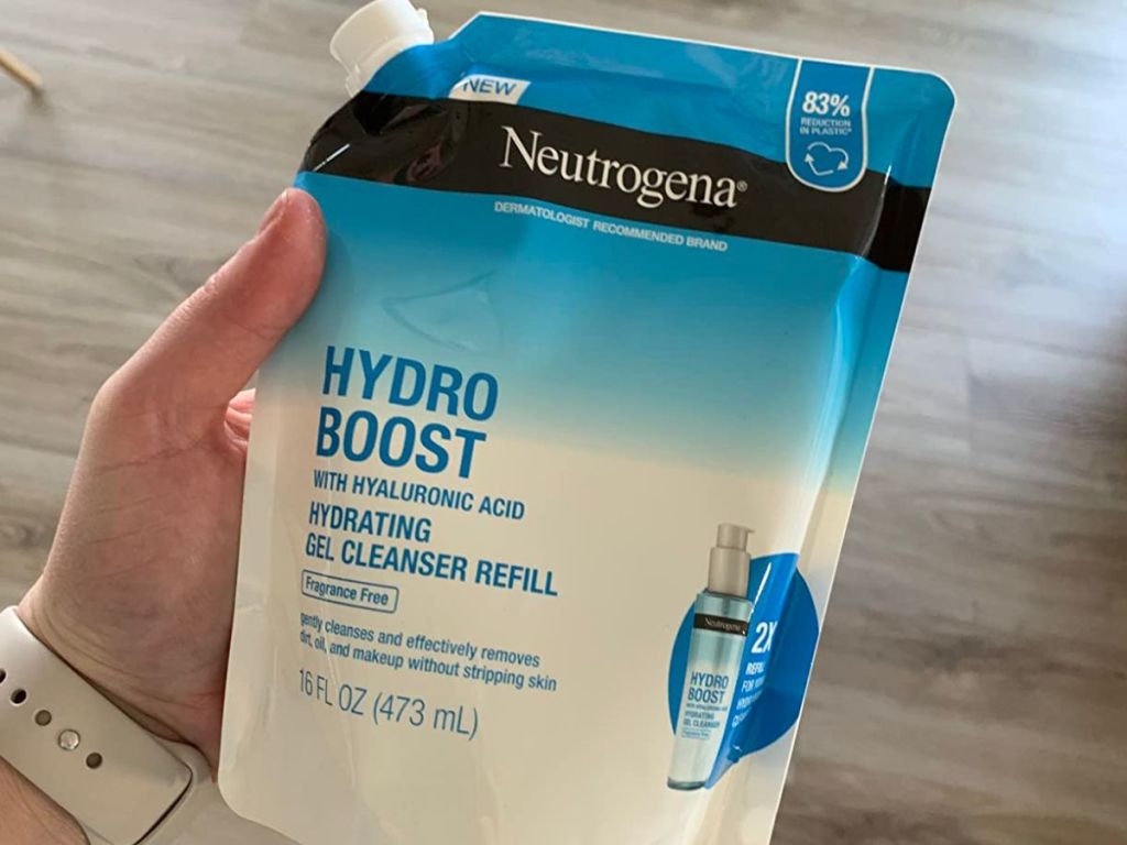 Hand holding a Neutrogena Hydro Boost Cleanser refill pouch