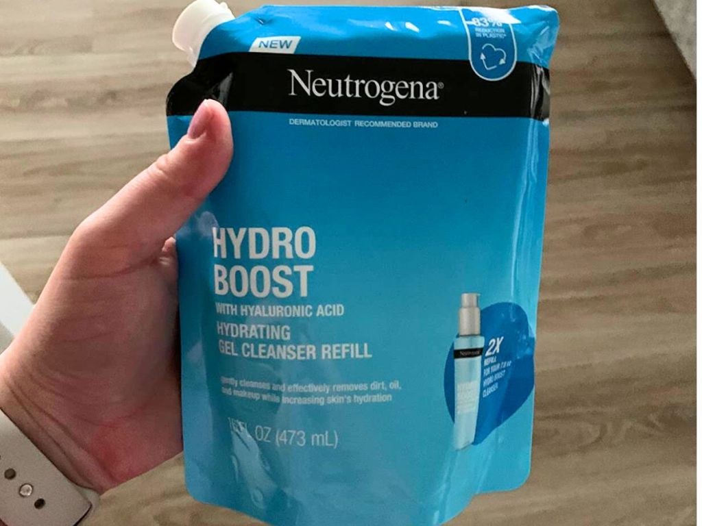 Hand holding up a Neutrogena Hydro Boost Cleanser refill Pouch