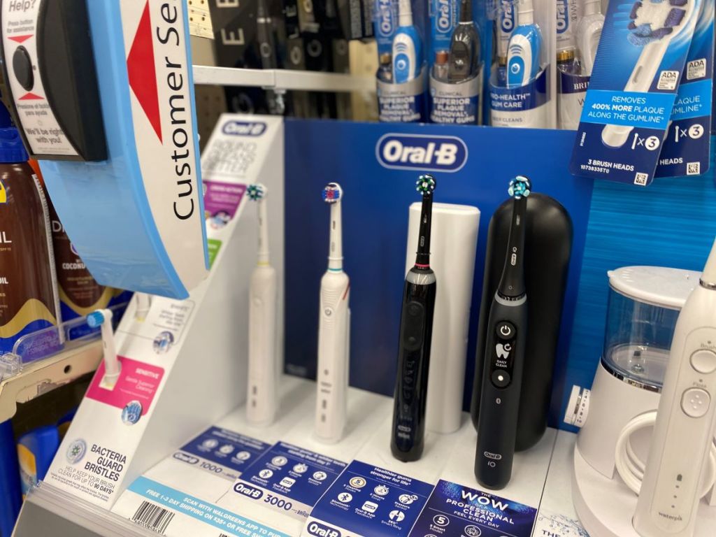 Row of toothbrushes on a shelf at Walgreens