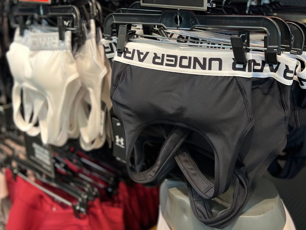 Under Armour Sports Bras hanging up at store