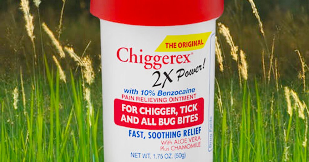 chiggerex bug relief bottle with grass behind