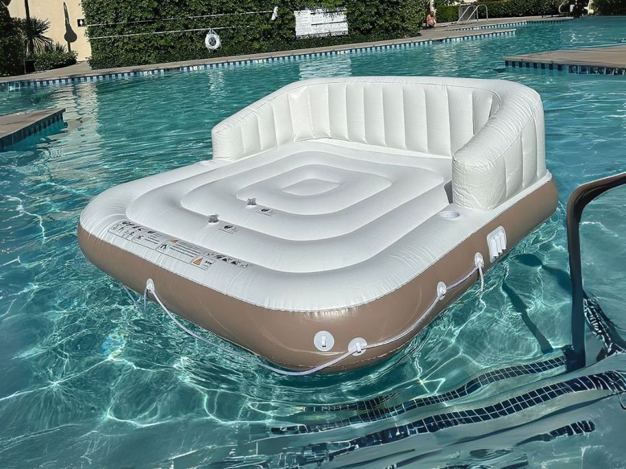 Costway Canopy Inflatable Pool Float Lounge Swimming Raft in pool