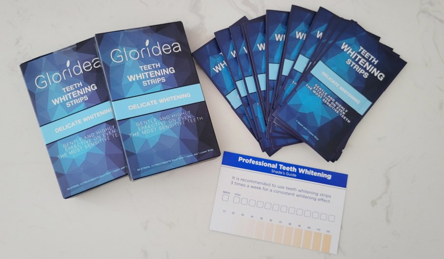 several teeth whitening strip packs laid out