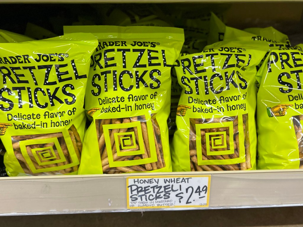 pretzel sticks in a row on shelf in trader joes