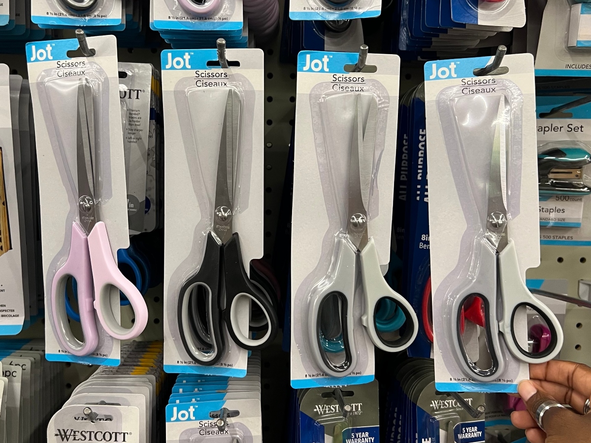 scissors hanging on pegs at Dollar Tree