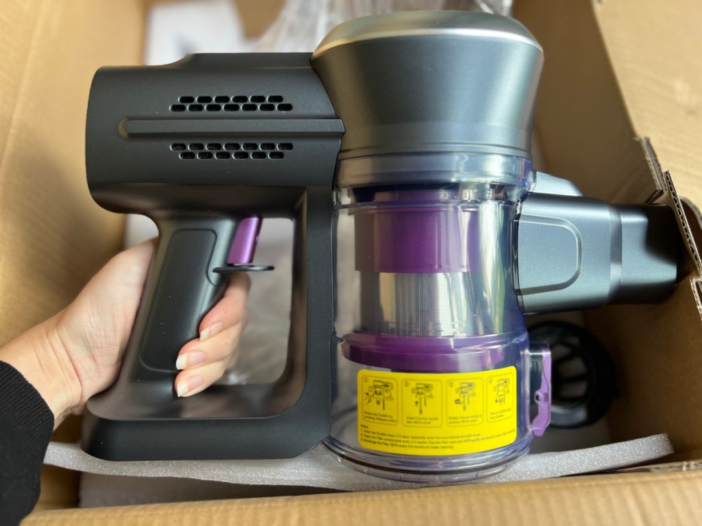 handheld cordless stick vacuum coming out of box
