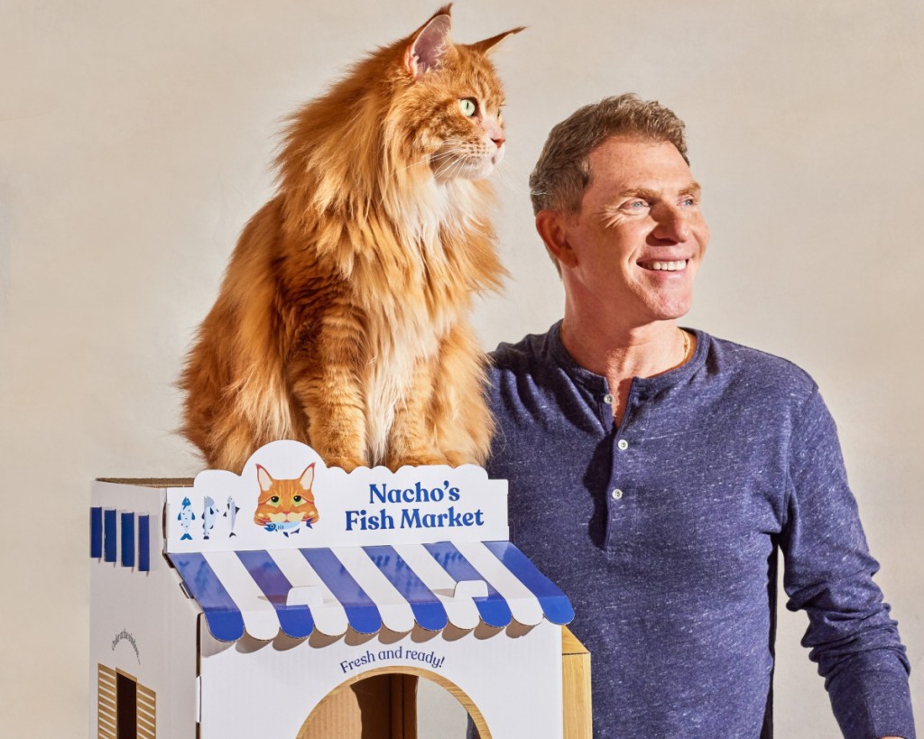 chef bobby flay with cat nacho