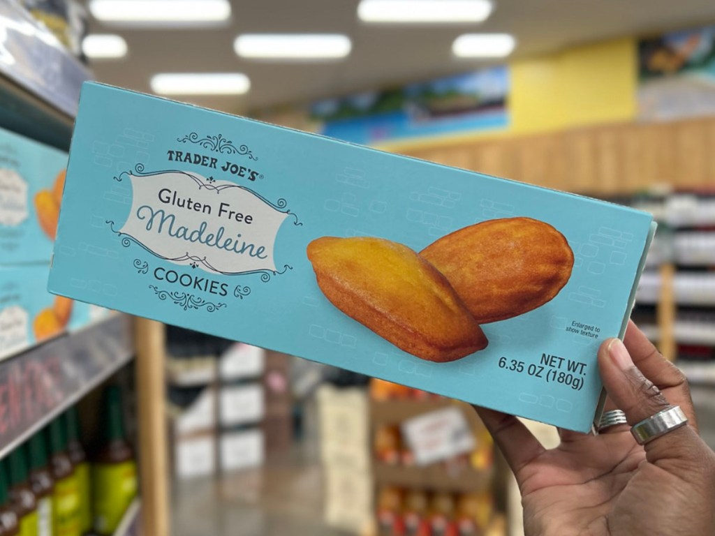 hand holding cookie box in trader joes