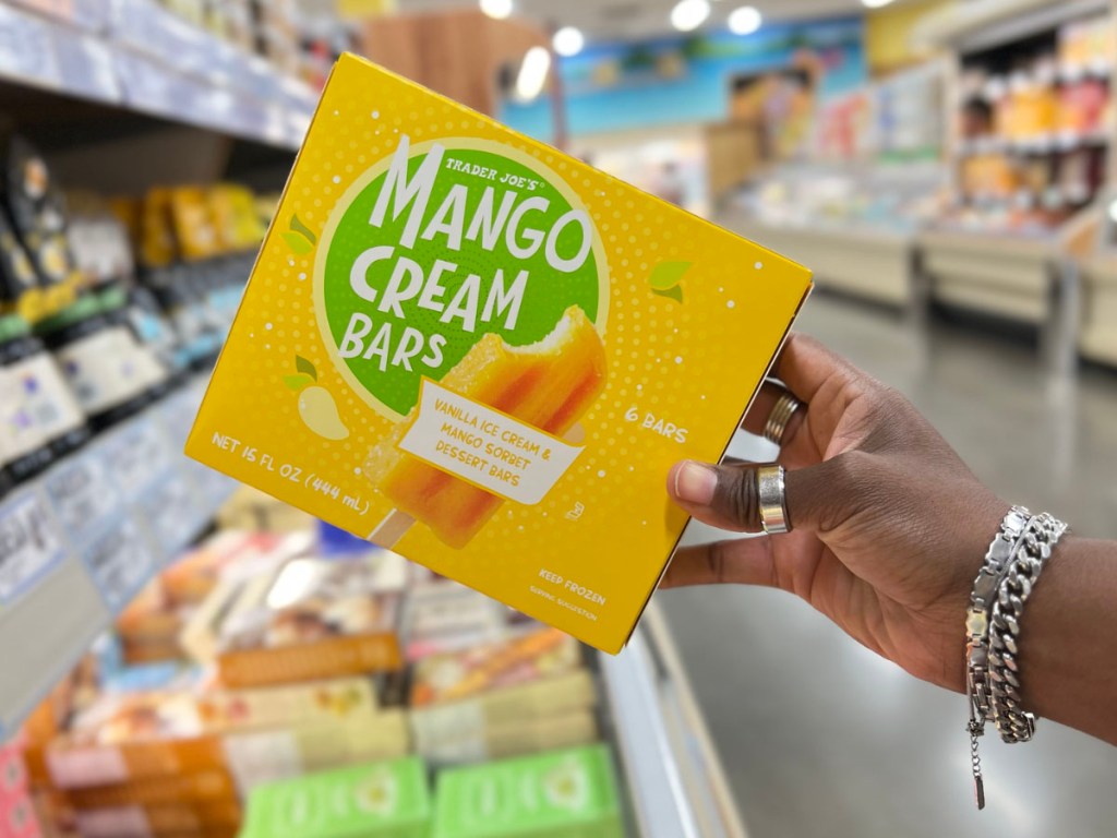 hand holding mango cream bars in trader joes