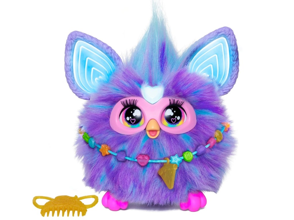 newest Furby with comb next to it