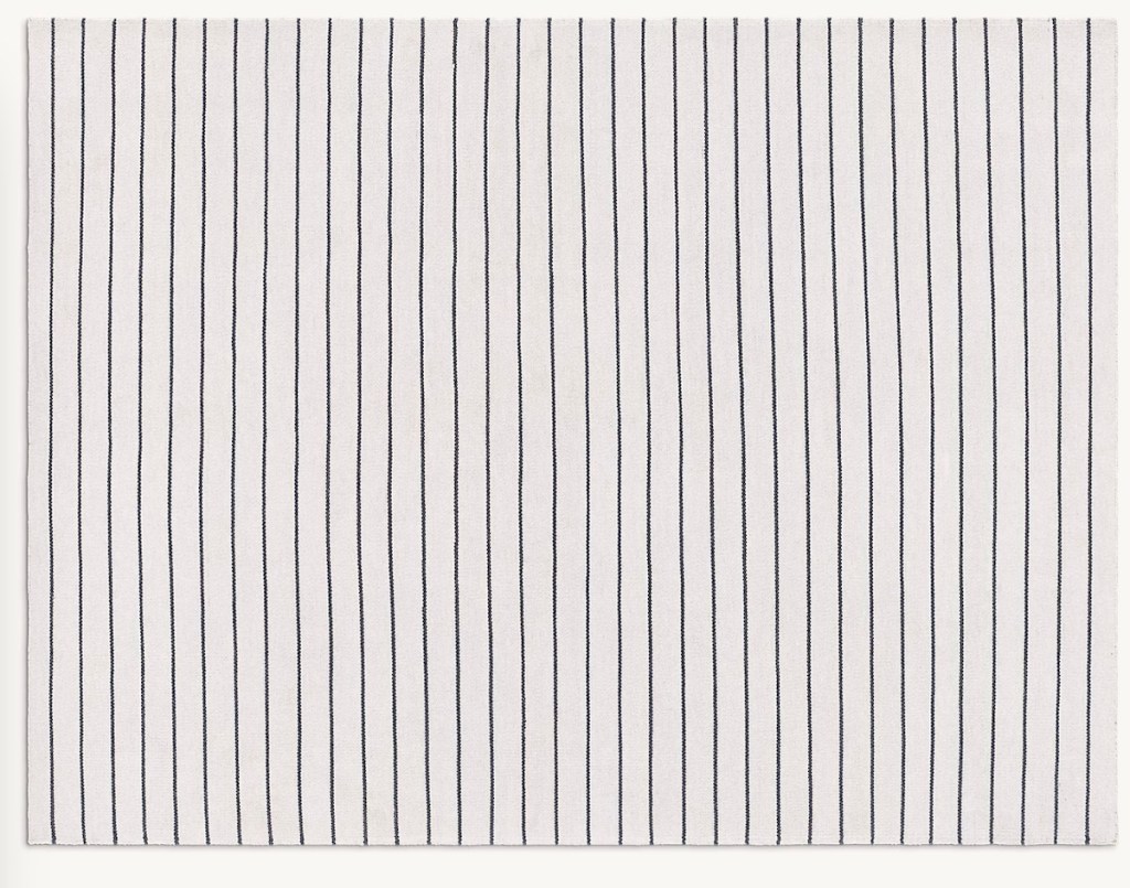 stock photo of cream stripe rug