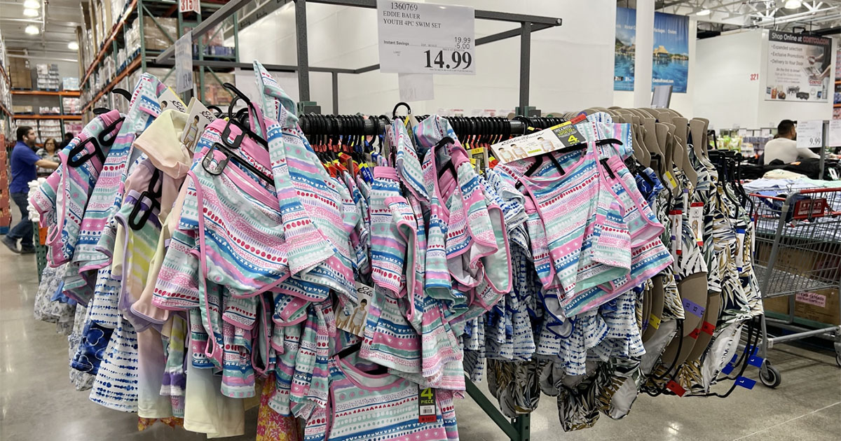 rainbow striped swimsuits on rack in costco store