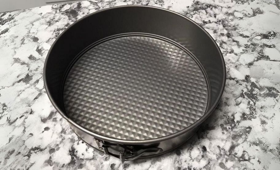 a springform pan on a granite countertop